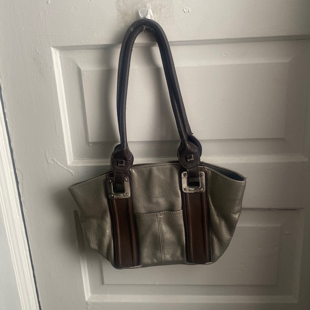 Thrifted bronzish and brown colored shoulder bag with slight sings of wear.